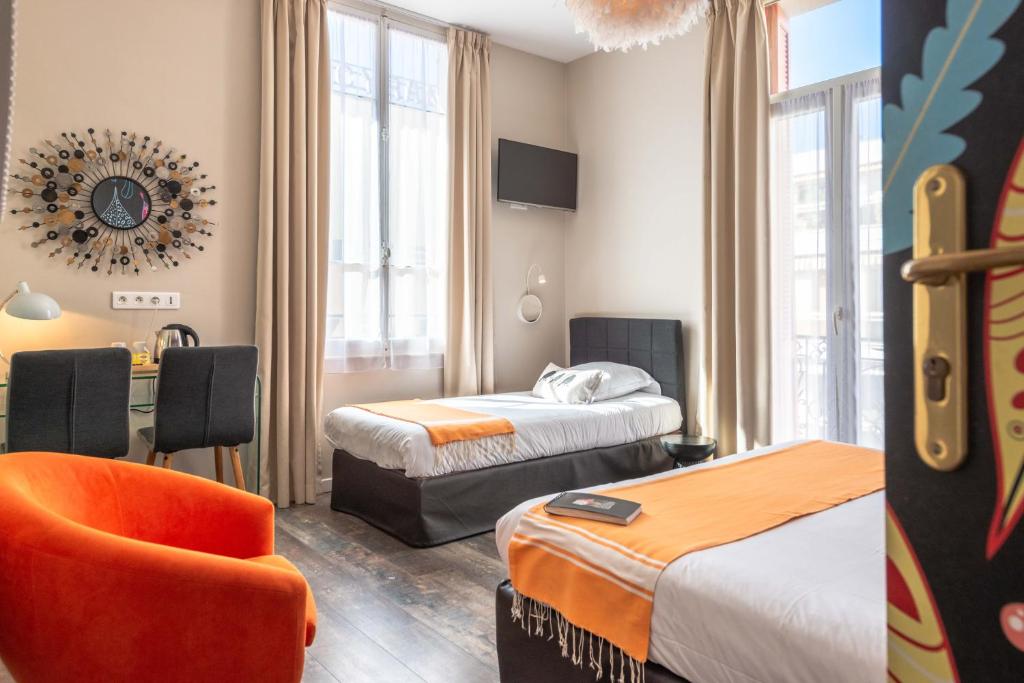 Postel nebo postele na pokoji v ubytování Hôtel Cecil - Adults only