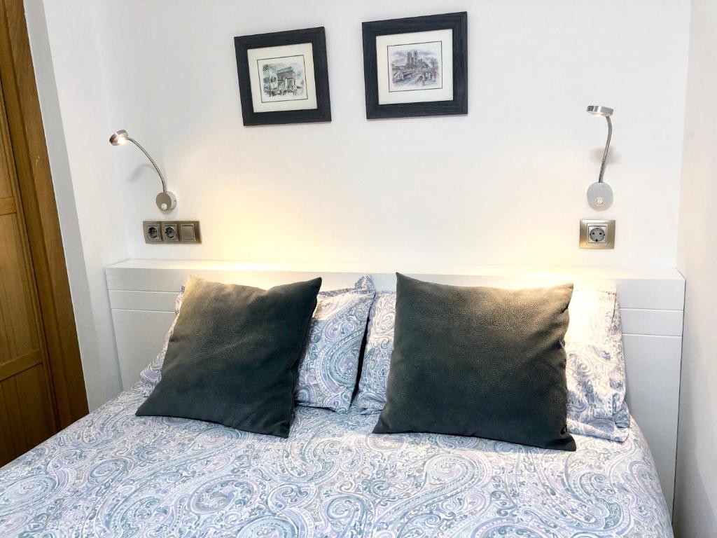 Posteľ alebo postele v izbe v ubytovaní Gros Beach Apartment
