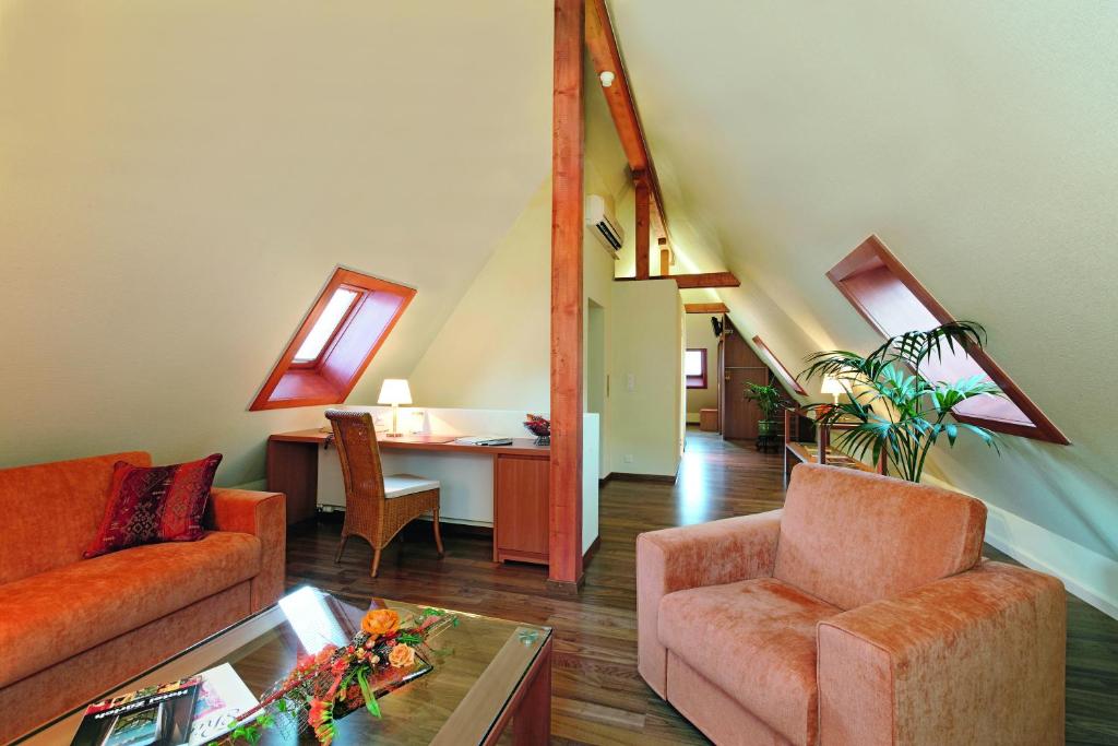 Posezení v ubytování Hotel Ambassador