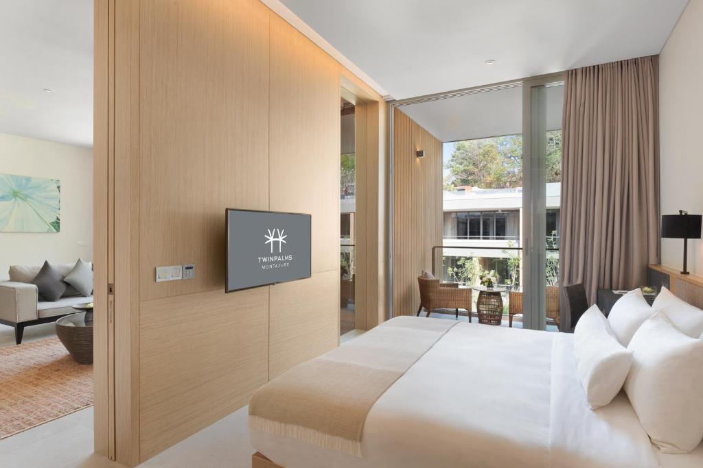 Twinpalms MontAzure Phuketにあるベッド
