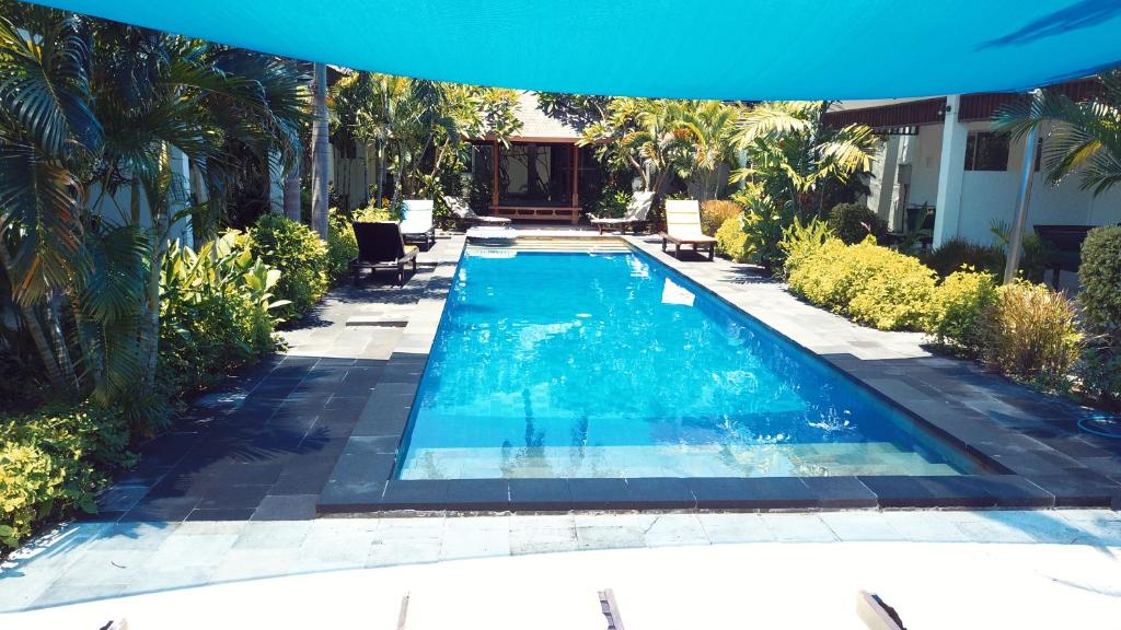 Bazén v ubytování Gili Palms Resort nebo v jeho okolí