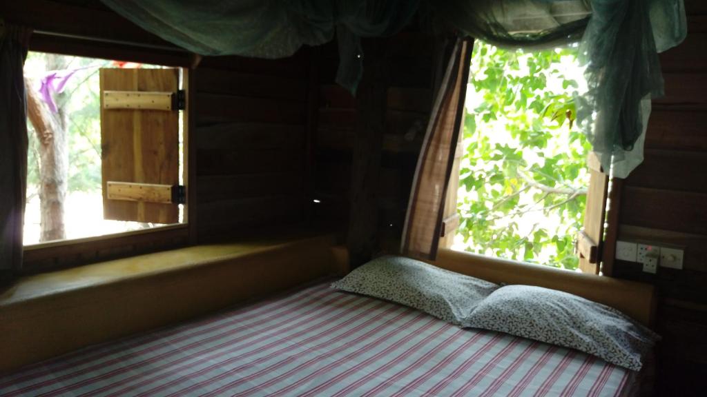 Postel nebo postele na pokoji v ubytování Beach Hut