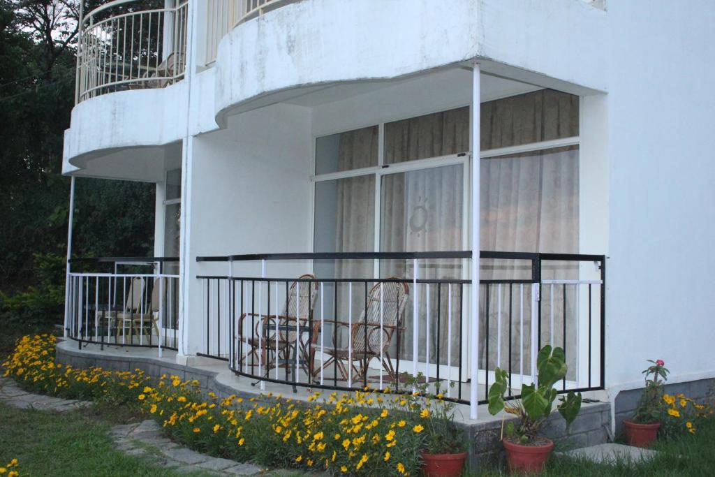 Balkón nebo terasa v ubytování The Cliff Resort, Munnar