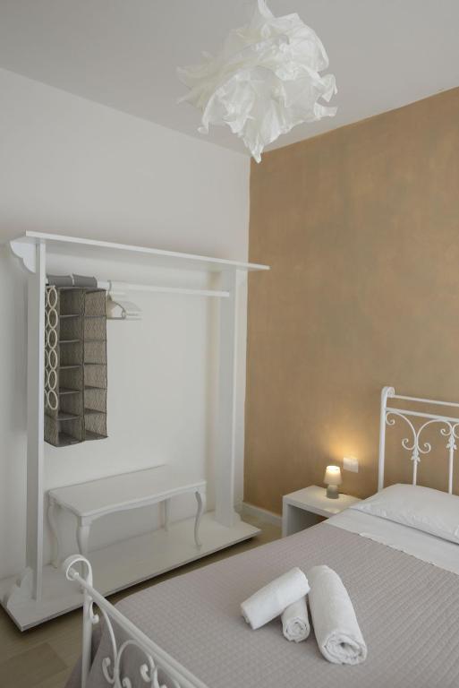 Postel nebo postele na pokoji v ubytování B&B Alghero 82