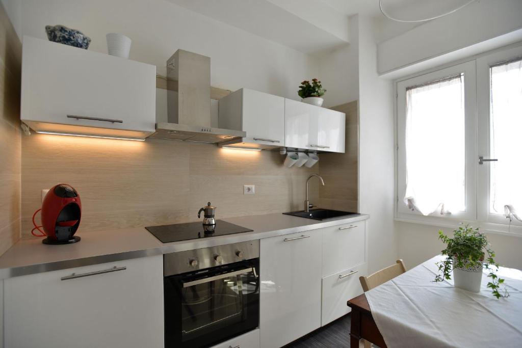 Kuchyň nebo kuchyňský kout v ubytování B&B Alghero 82