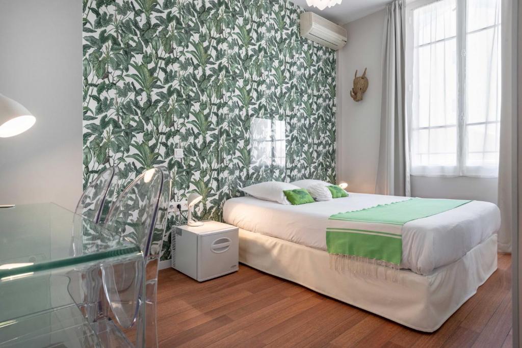 Postel nebo postele na pokoji v ubytování Hôtel Cecil - Adults only