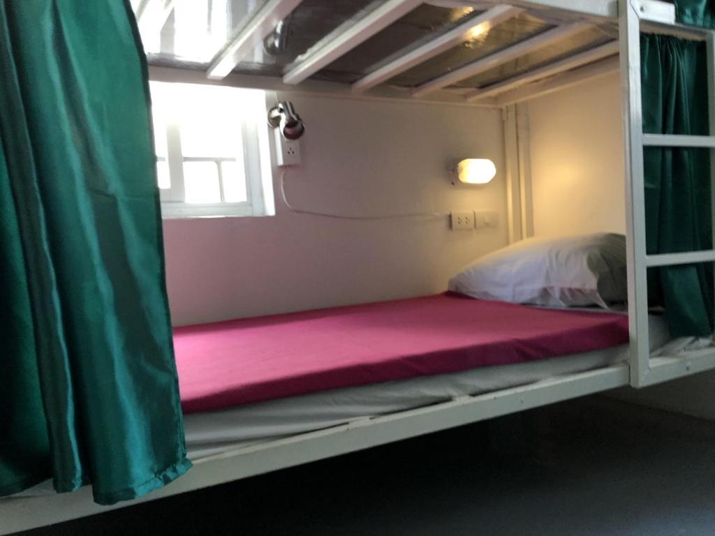 Postel nebo postele na pokoji v ubytování PLOY Hostel
