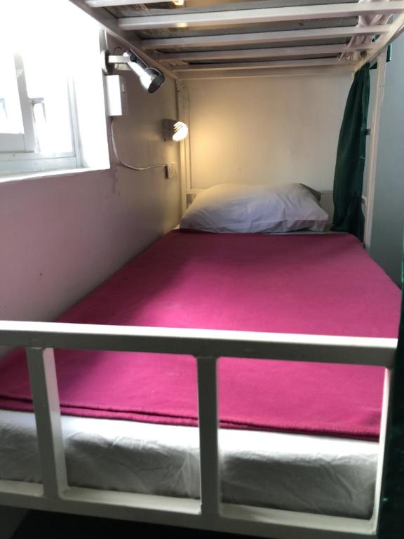 Postel nebo postele na pokoji v ubytování PLOY Hostel
