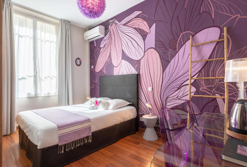 Postel nebo postele na pokoji v ubytování Hôtel Cecil - Adults only