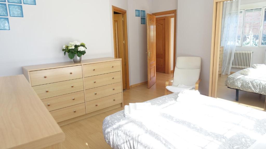 Postel nebo postele na pokoji v ubytování Villa Flores