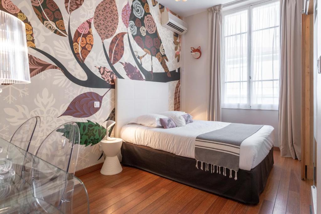 Postel nebo postele na pokoji v ubytování Hôtel Cecil - Adults only