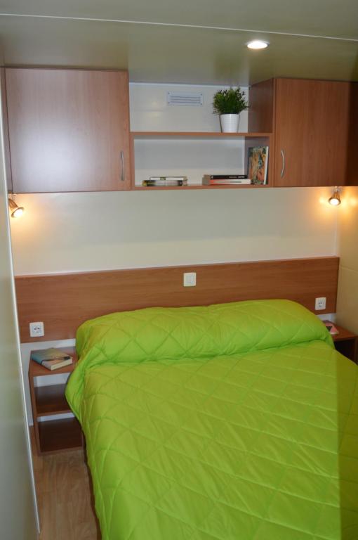 Postel nebo postele na pokoji v ubytování Camping Royal
