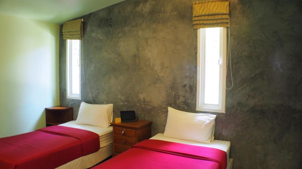 Postel nebo postele na pokoji v ubytování Pennapa Chalet