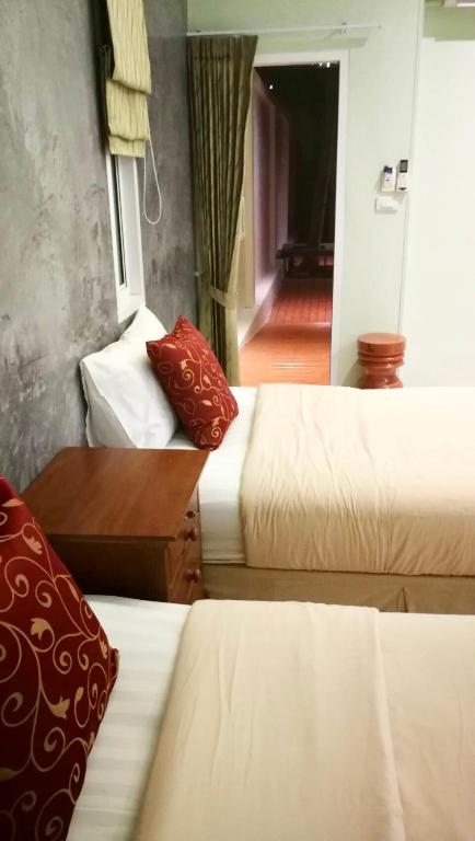 Postel nebo postele na pokoji v ubytování Pennapa Chalet