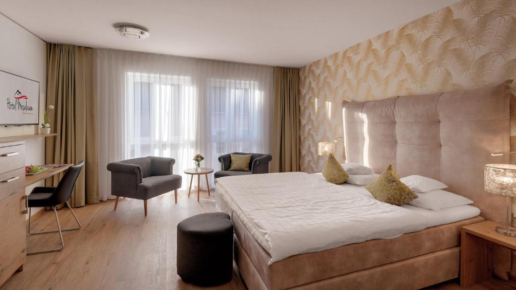 Postel nebo postele na pokoji v ubytování Hotel Moselauen