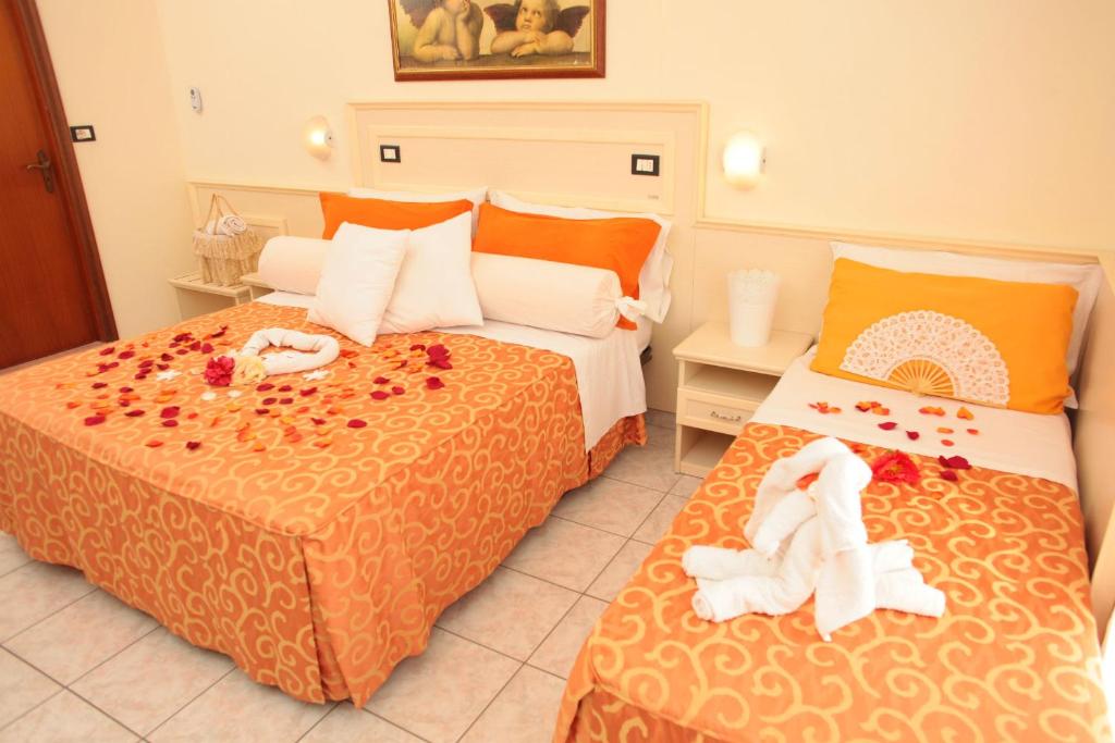 Postel nebo postele na pokoji v ubytování Hotel Stefan Room & Breakfast