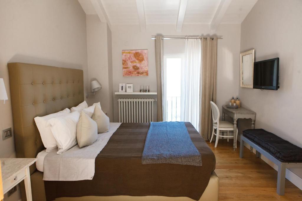 Postel nebo postele na pokoji v ubytování Misia Resort