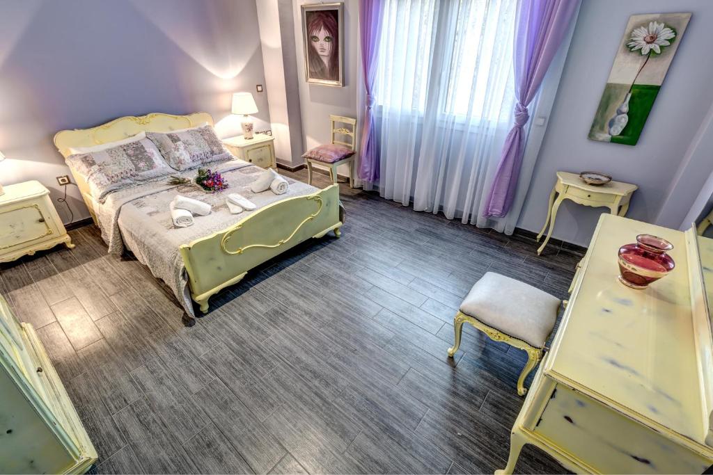 Postel nebo postele na pokoji v ubytování Villa Intemella