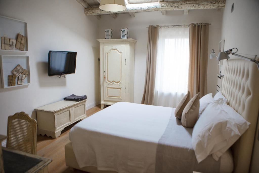 Postel nebo postele na pokoji v ubytování Misia Resort