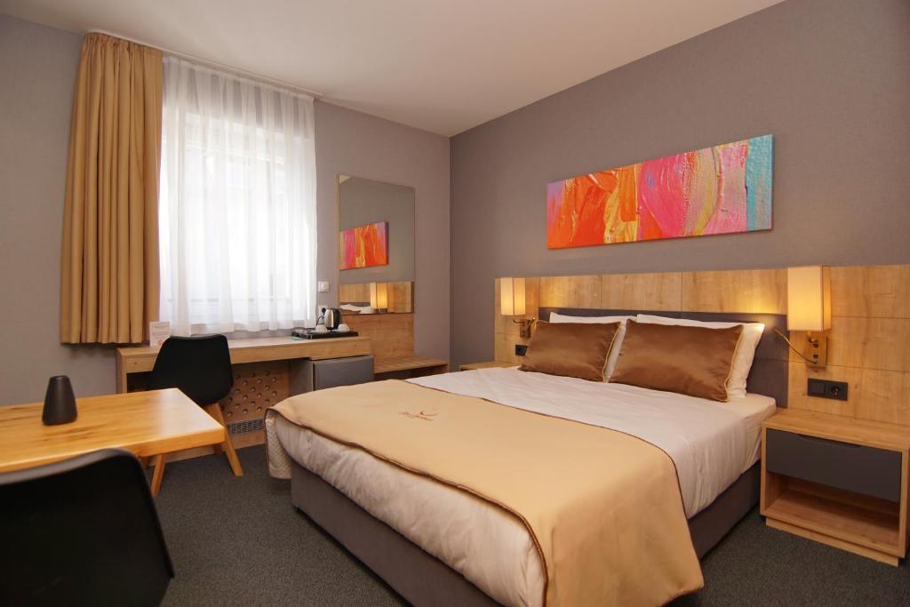 Postel nebo postele na pokoji v ubytování Casa Constanza Hotel Garni