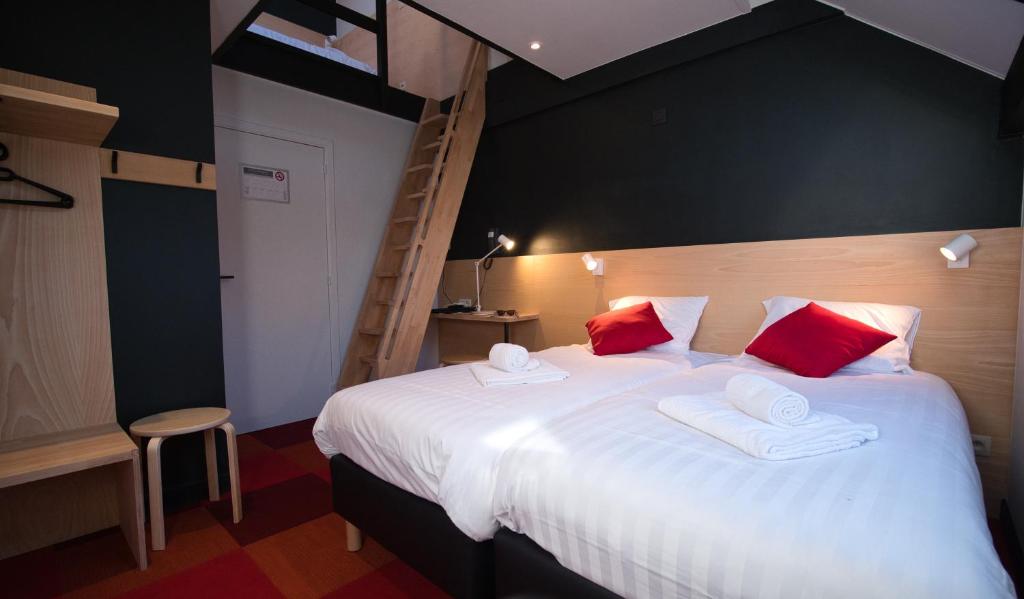 Postel nebo postele na pokoji v ubytování Hotel Aquatel