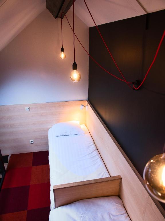 Postel nebo postele na pokoji v ubytování Hotel Aquatel
