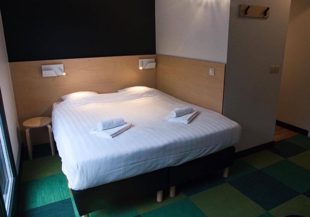 Postel nebo postele na pokoji v ubytování Hotel Aquatel