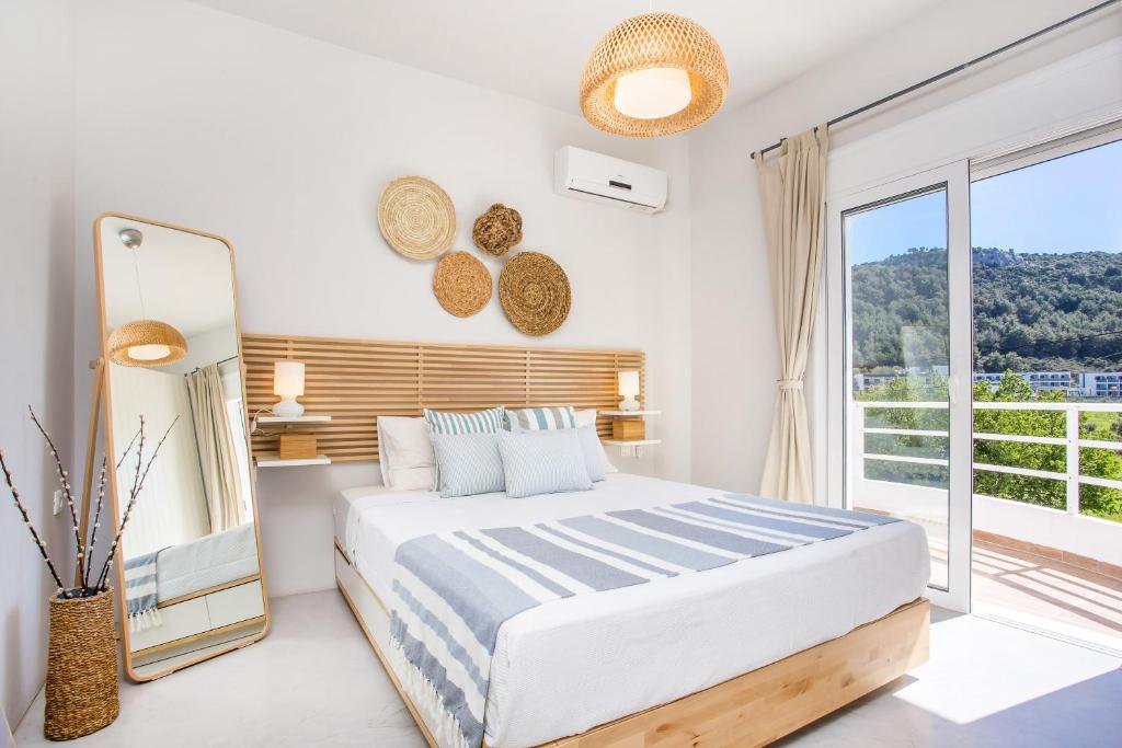 Postel nebo postele na pokoji v ubytování Euphoria Luxury apartment
