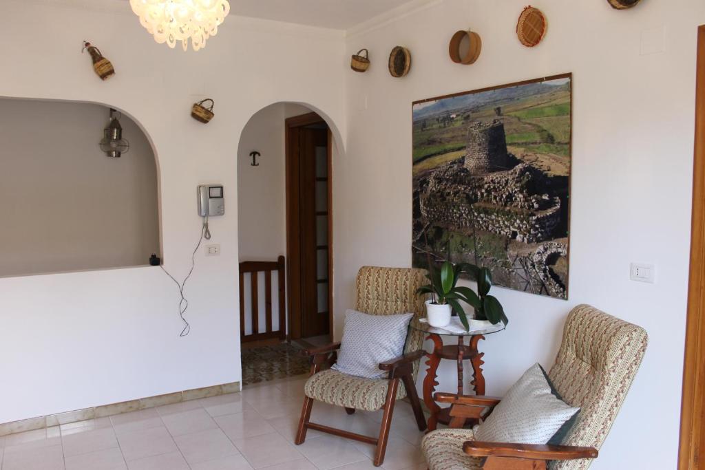 Posezení v ubytování B&B Su Nuraghe