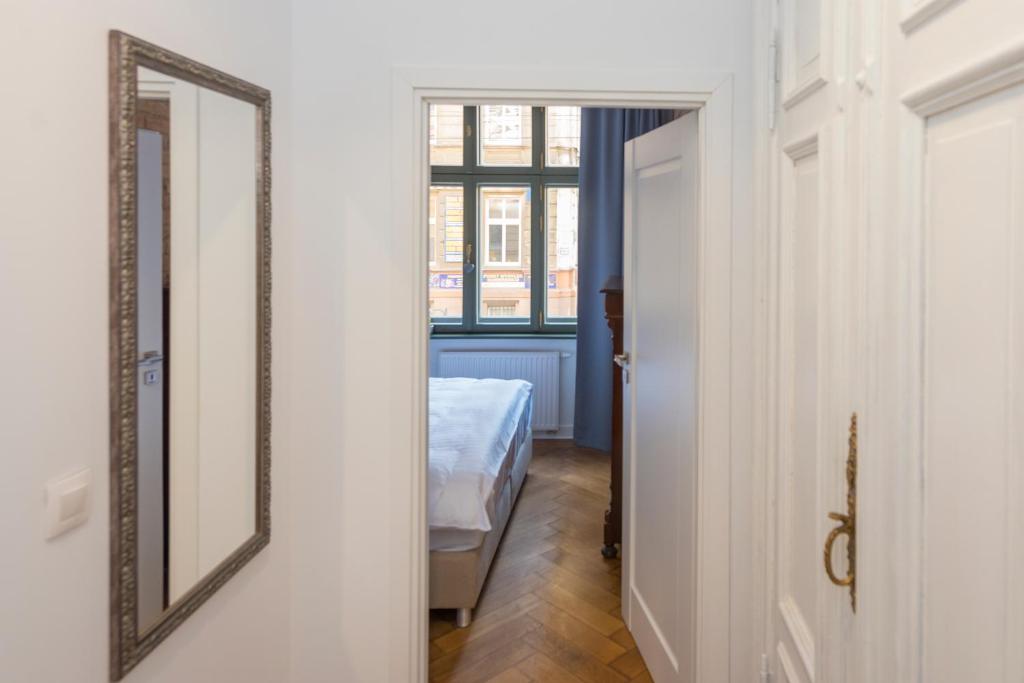 Posteľ alebo postele v izbe v ubytovaní PROVENIR HOME STRZELECKA 25
