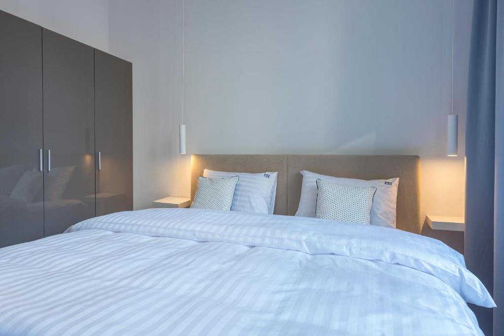 Posteľ alebo postele v izbe v ubytovaní PROVENIR HOME STRZELECKA 25