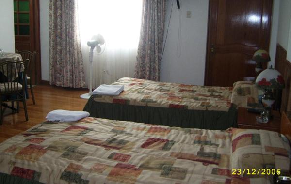 Postel nebo postele na pokoji v ubytování Hostal Camiluz