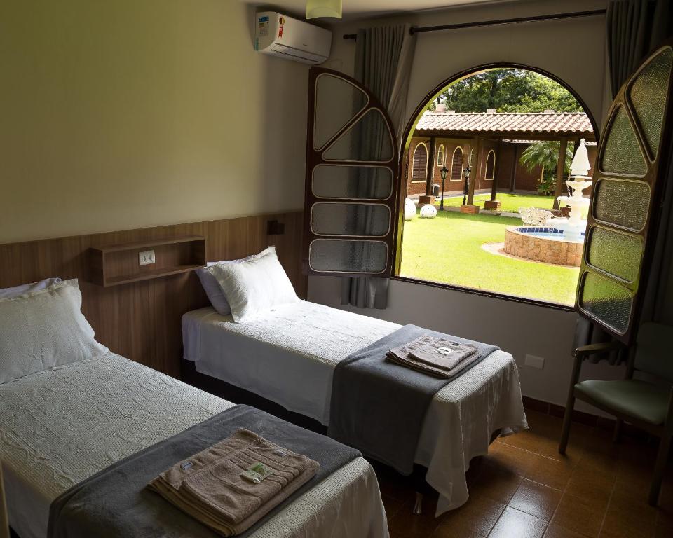 Postel nebo postele na pokoji v ubytování Hostel SLG