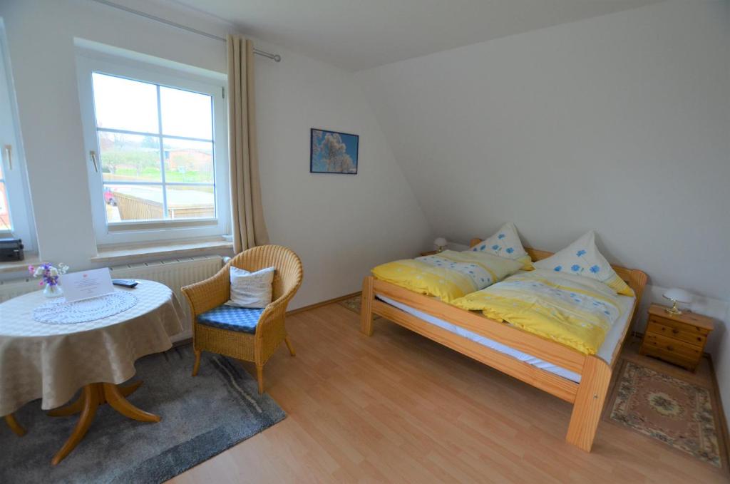 Postel nebo postele na pokoji v ubytování Haus Junior