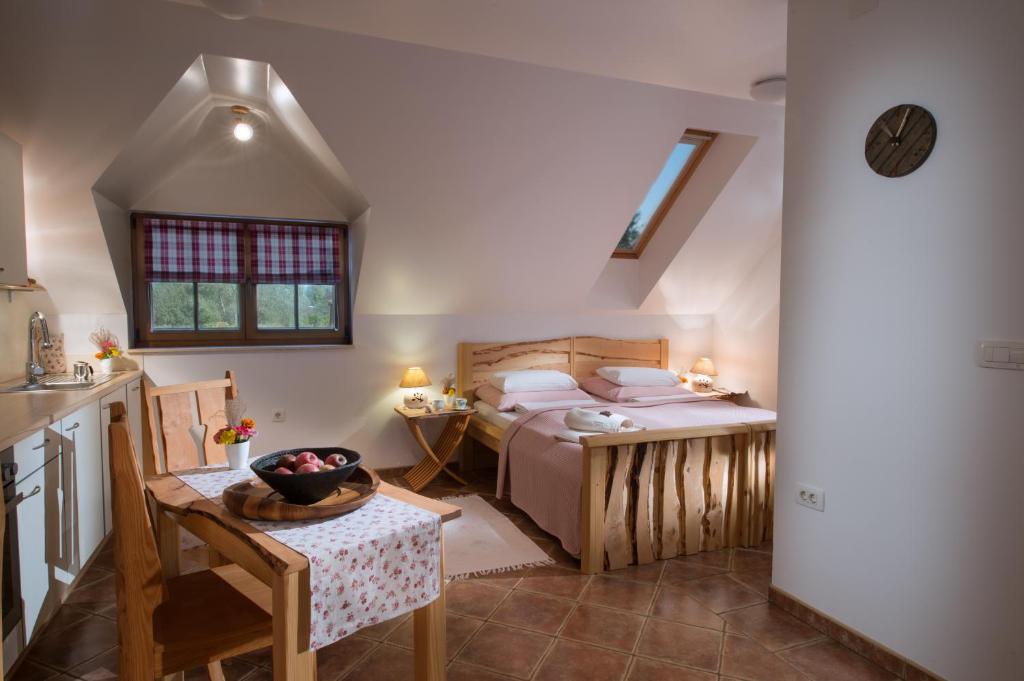 Postel nebo postele na pokoji v ubytování Bio Apartments Trnulja