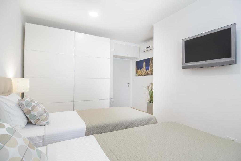 Posteľ alebo postele v izbe v ubytovaní Holiday Home Aspalathos - with free parking, near the beach, a few minutes' walking distance to the UNESCO Palace