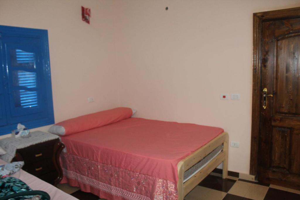 Postel nebo postele na pokoji v ubytování Tunis Village Chalet