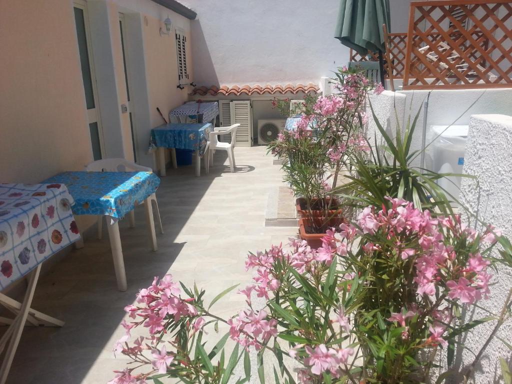 Balkón nebo terasa v ubytování piccolo monolocale al porticciolo