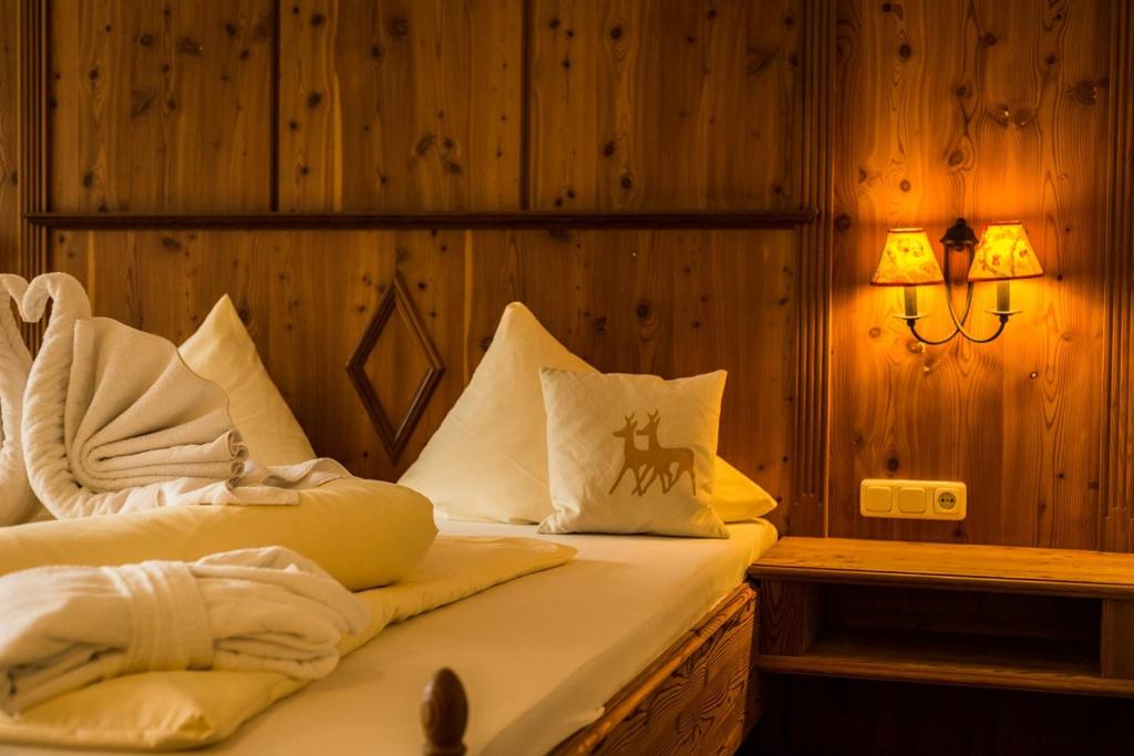 Postel nebo postele na pokoji v ubytování Ruhehotel & Naturresort Rehbach - Adults only