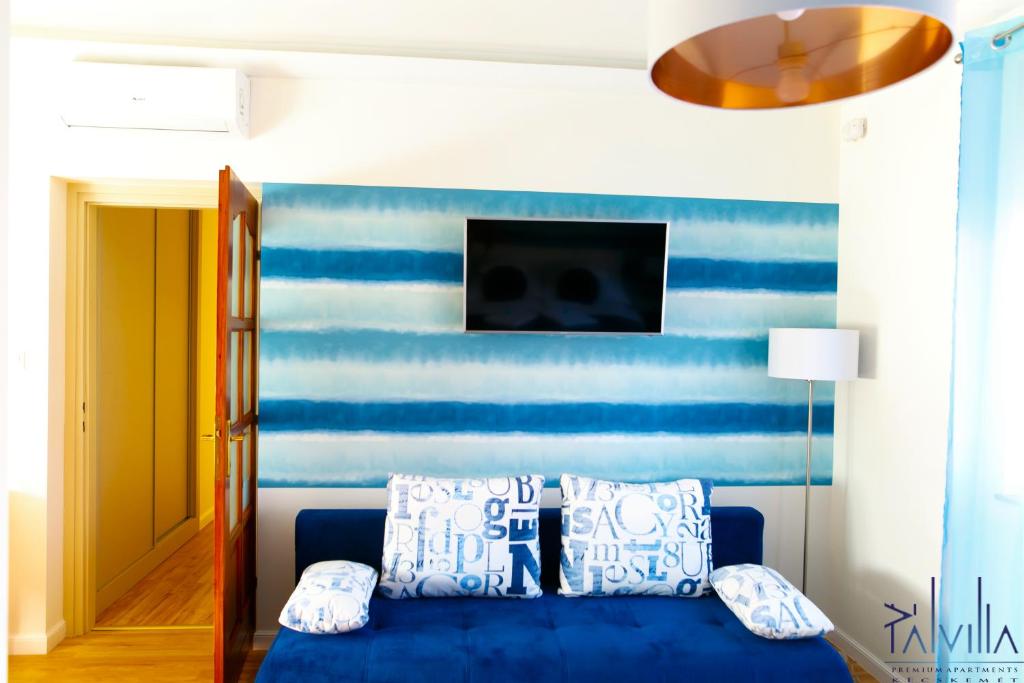 TV a/nebo společenská místnost v ubytování Pál Villa - Premium Apartments - Kecskemét