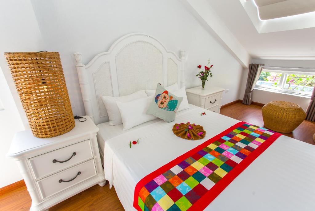 Postel nebo postele na pokoji v ubytování Peach House