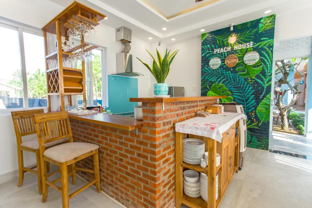 Kuchyň nebo kuchyňský kout v ubytování Peach House