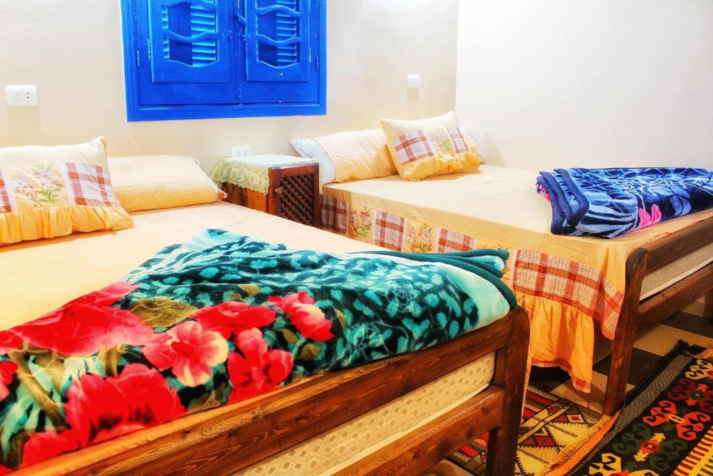 Postel nebo postele na pokoji v ubytování Tunis Village Chalet