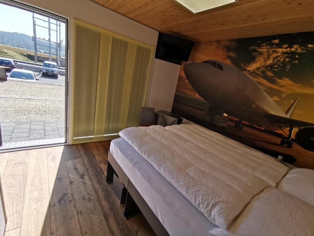 Postel nebo postele na pokoji v ubytování Boutique Hotel BS16 before Bern City Parking gratis