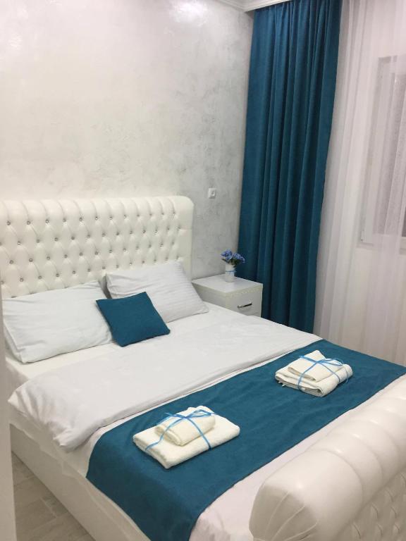 Postel nebo postele na pokoji v ubytování Nikas Guest House