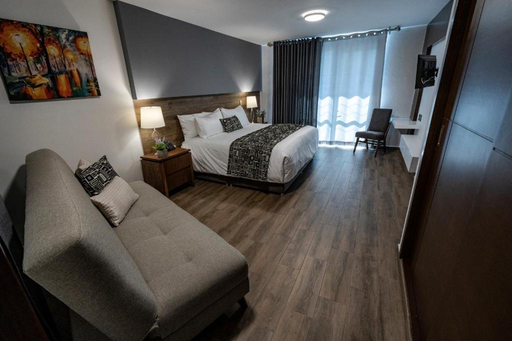 Postel nebo postele na pokoji v ubytování Hotel Corral Grande