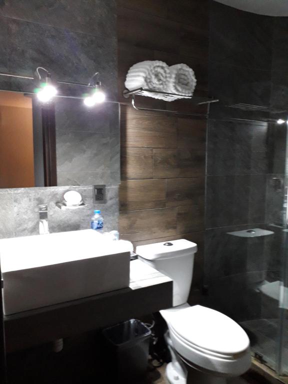Koupelna v ubytování Hotel Corral Grande
