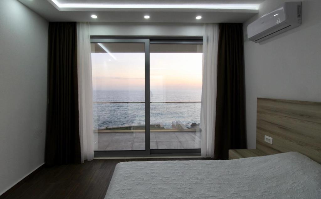 Ένα ή περισσότερα κρεβάτια σε δωμάτιο στο Apartments Komina