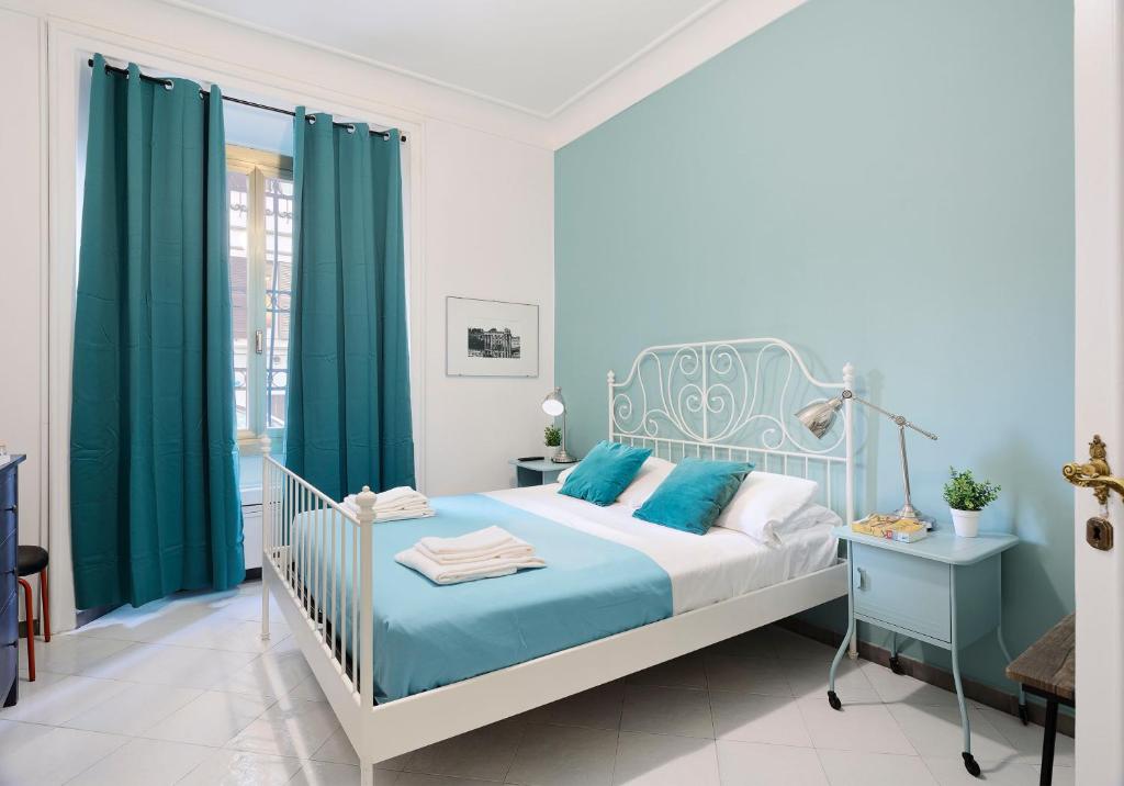 Uma cama ou camas num quarto em Locanderia Roma