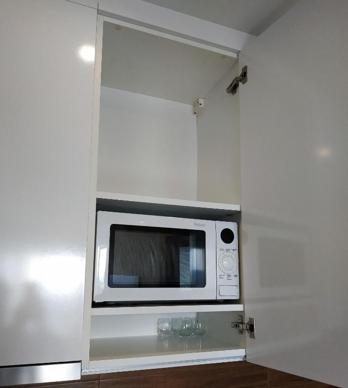 Kuchyň nebo kuchyňský kout v ubytování Apartment near Lukyanovka Square